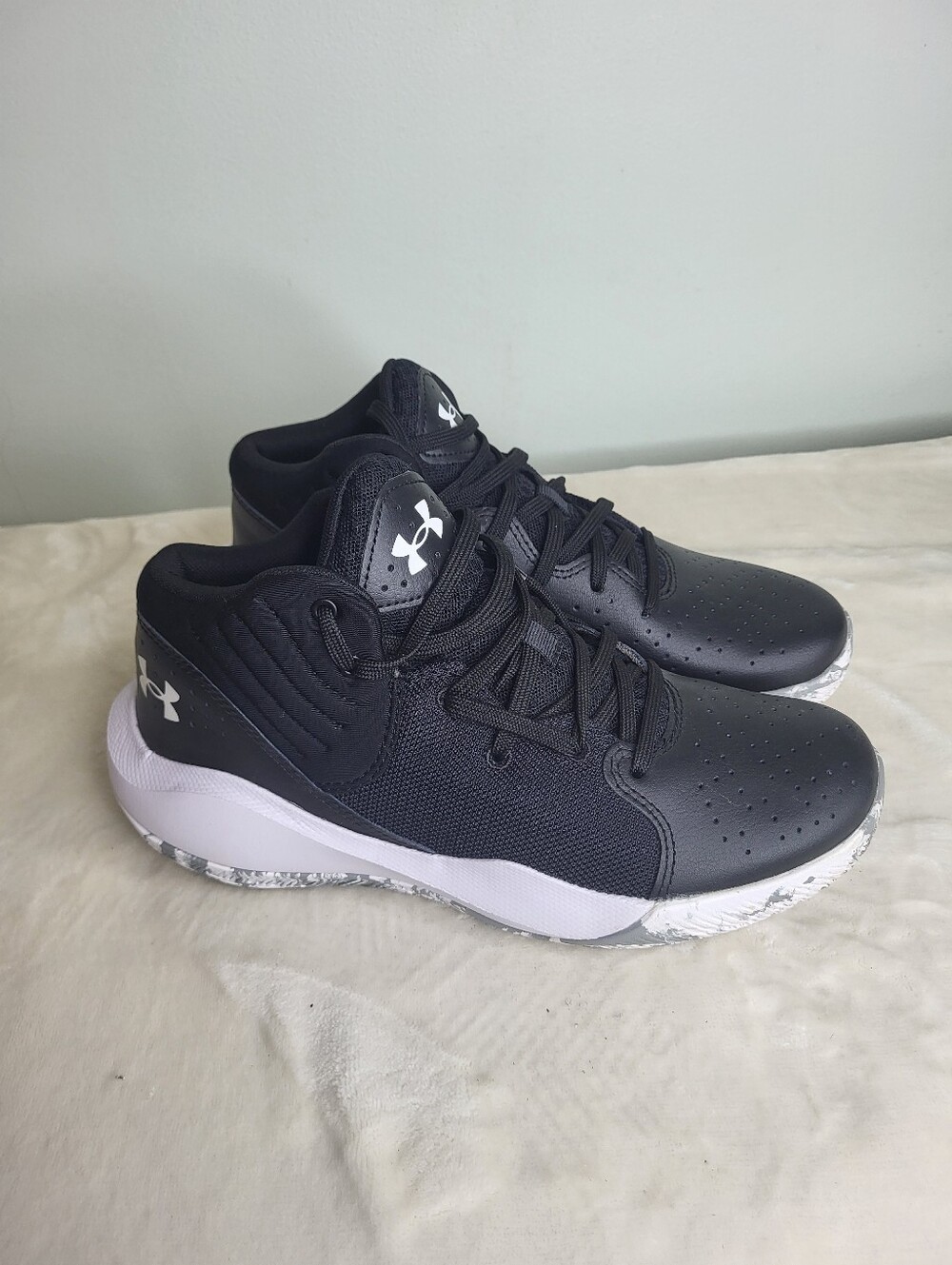 Under Armour Jet 21 Black and White High-Top Sneakers.